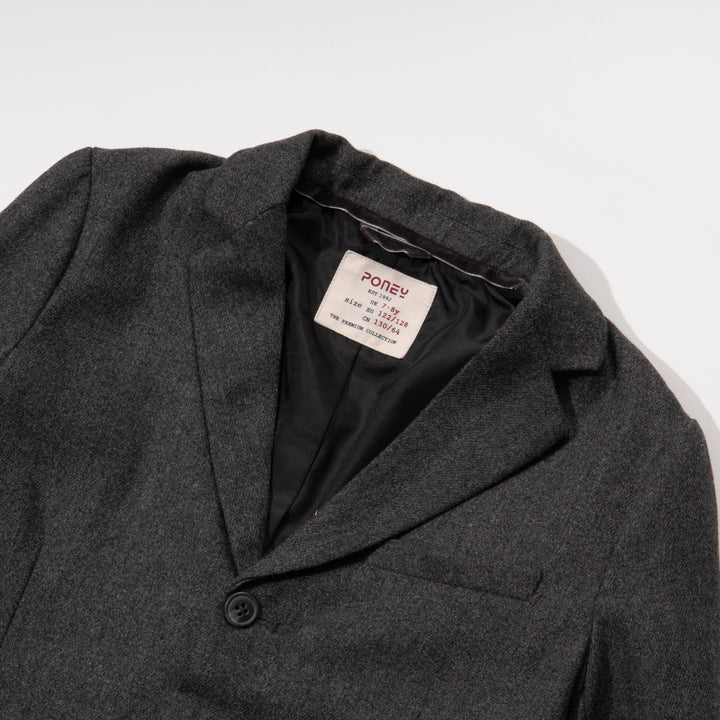 Black jacket. Button Fastened at the front, two large pockets included.