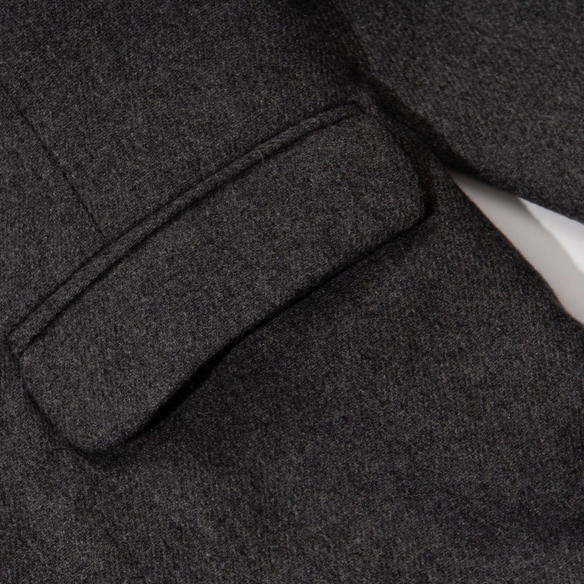 Black jacket. Button Fastened at the front, two large pockets included.