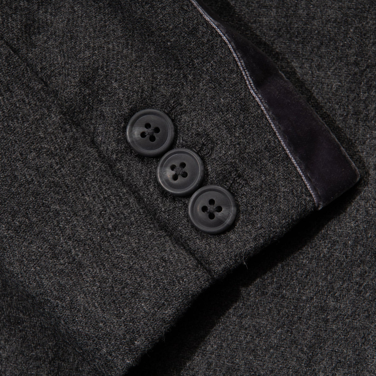 Black jacket. Button Fastened at the front, two large pockets included.