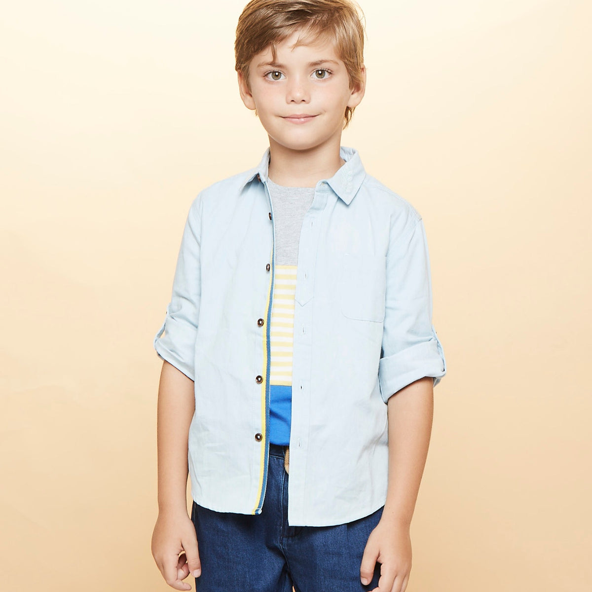 Casual denim shirt, embroidered spread collar, tie-up long sleeves. blue/yellow lining and a side pocket is given for convenience