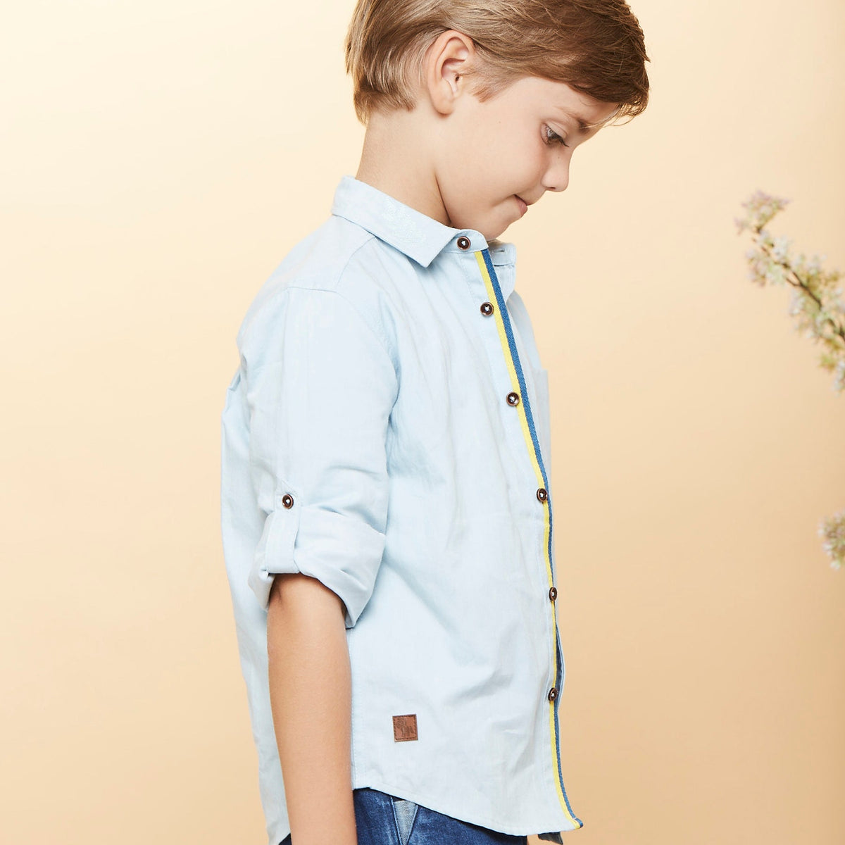 Casual denim shirt, embroidered spread collar, tie-up long sleeves. blue/yellow lining and a side pocket is given for convenience
