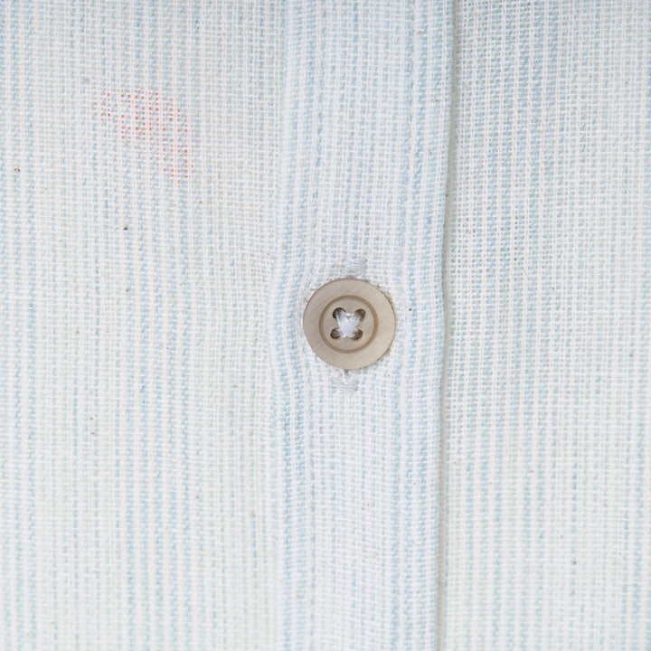 Full sleeve, grandad shirt, front fastening, buttoned cuffs with a logo tag. Suited for all occasions. 