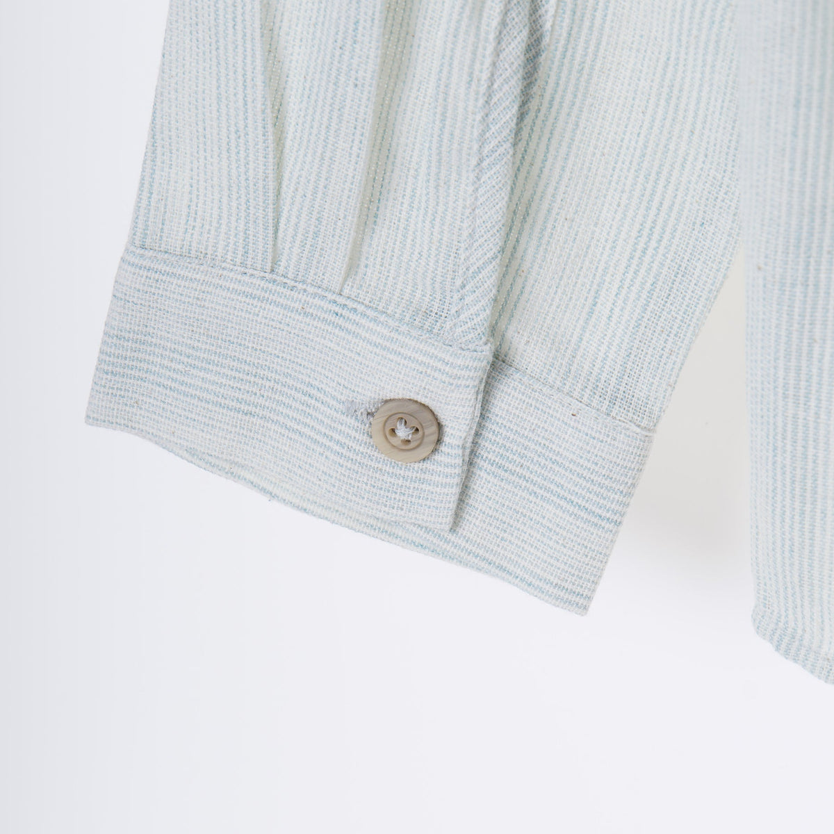 Full sleeve, grandad shirt, front fastening, buttoned cuffs with a logo tag. Suited for all occasions. 