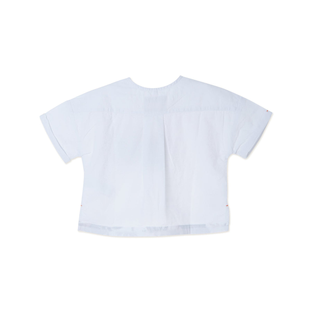 White tropical themed shirt, buttoned shoulder strap, front pocket. Back hem slightly longer than the front. Logo tag attached. 