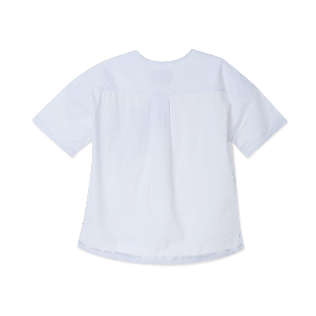 White tropical themed shirt, buttoned shoulder strap, front pocket. Back hem slightly longer than the front. Logo tag attached. 