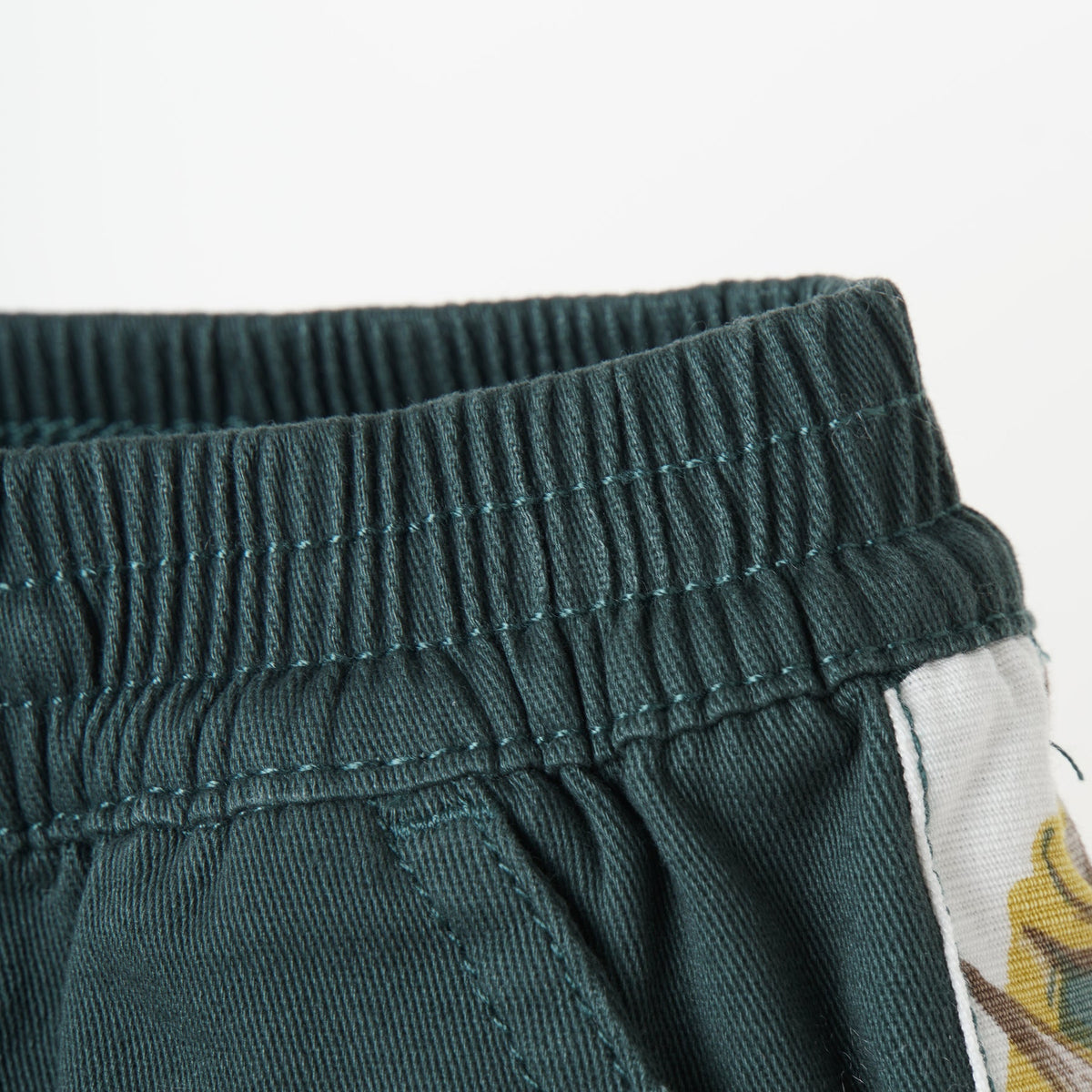 Green Shorts, Floral Side Stripes, Tacked functional fancy drawstrings, Poney Logo, One Pocket at the back.  