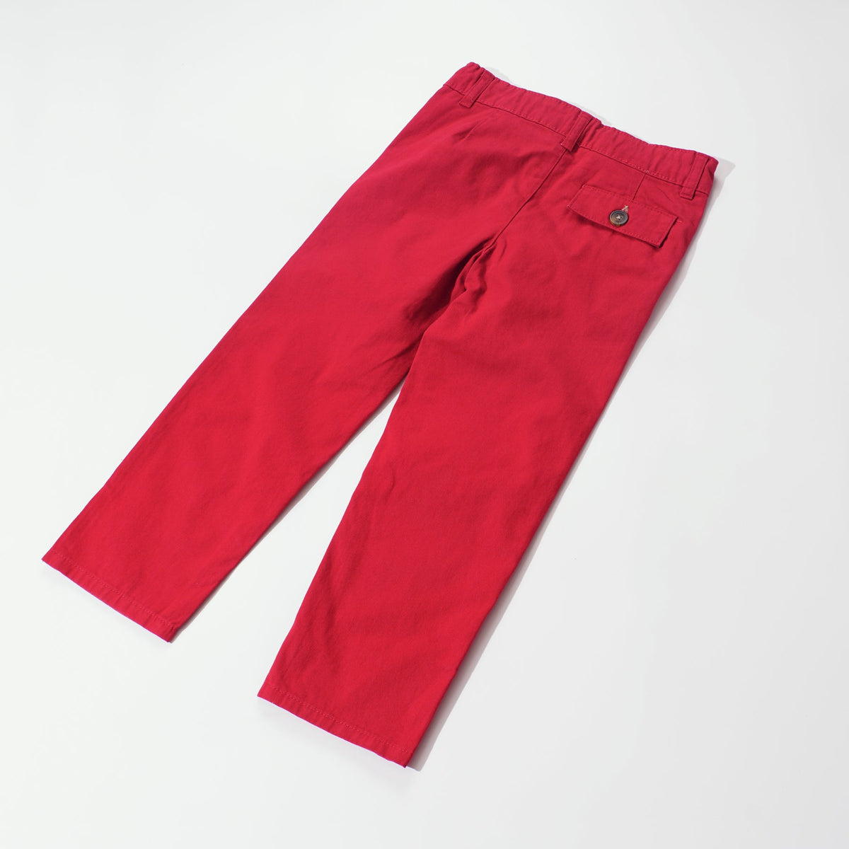 Elasticated red trouser, front button and zipper fastening. Two front pockets and poney logo, buttoned back pocket. 