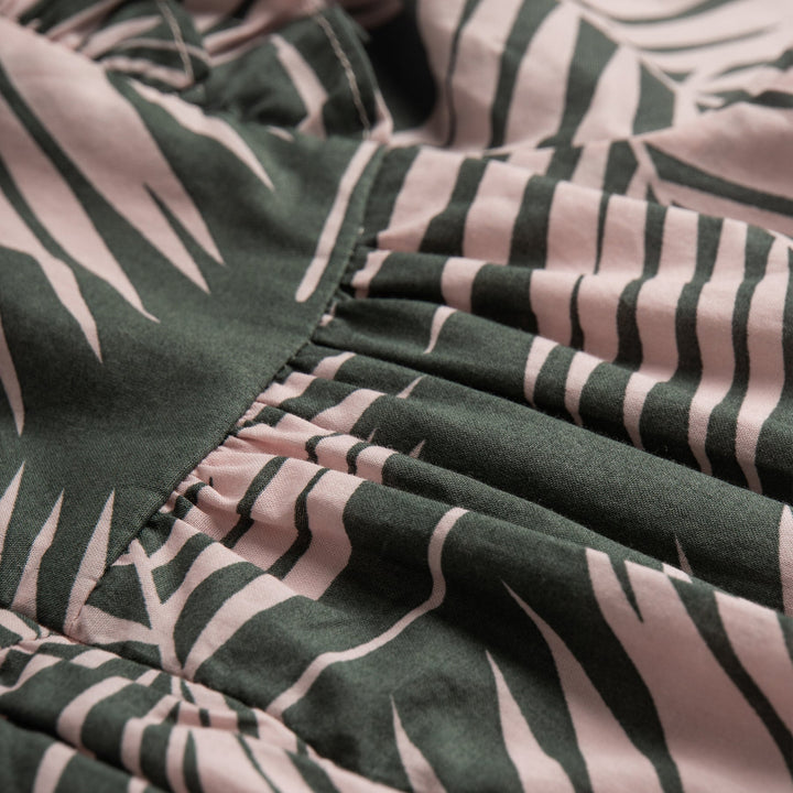 Tropical Green Dress, Long Sleeve, Frilly cuffs and short chested.