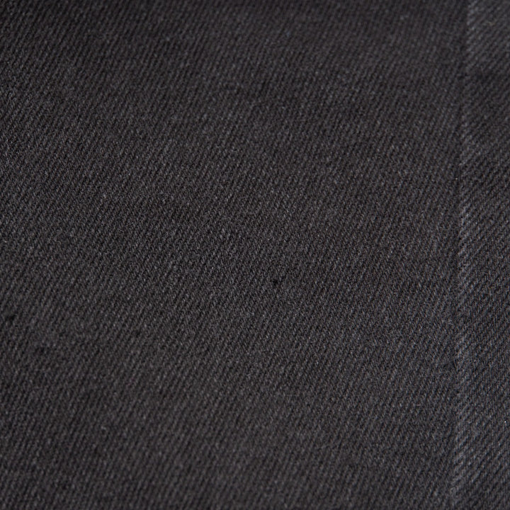 Elasticated Black Jeans, front zipper and button fastening. Embroidered back pockets, adjustable button included in the waist band.  