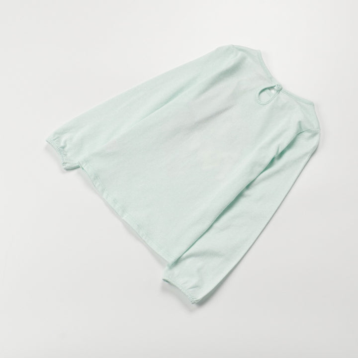Girl-Power embossed light green, long sleeve t-shirt, buttoned at the back