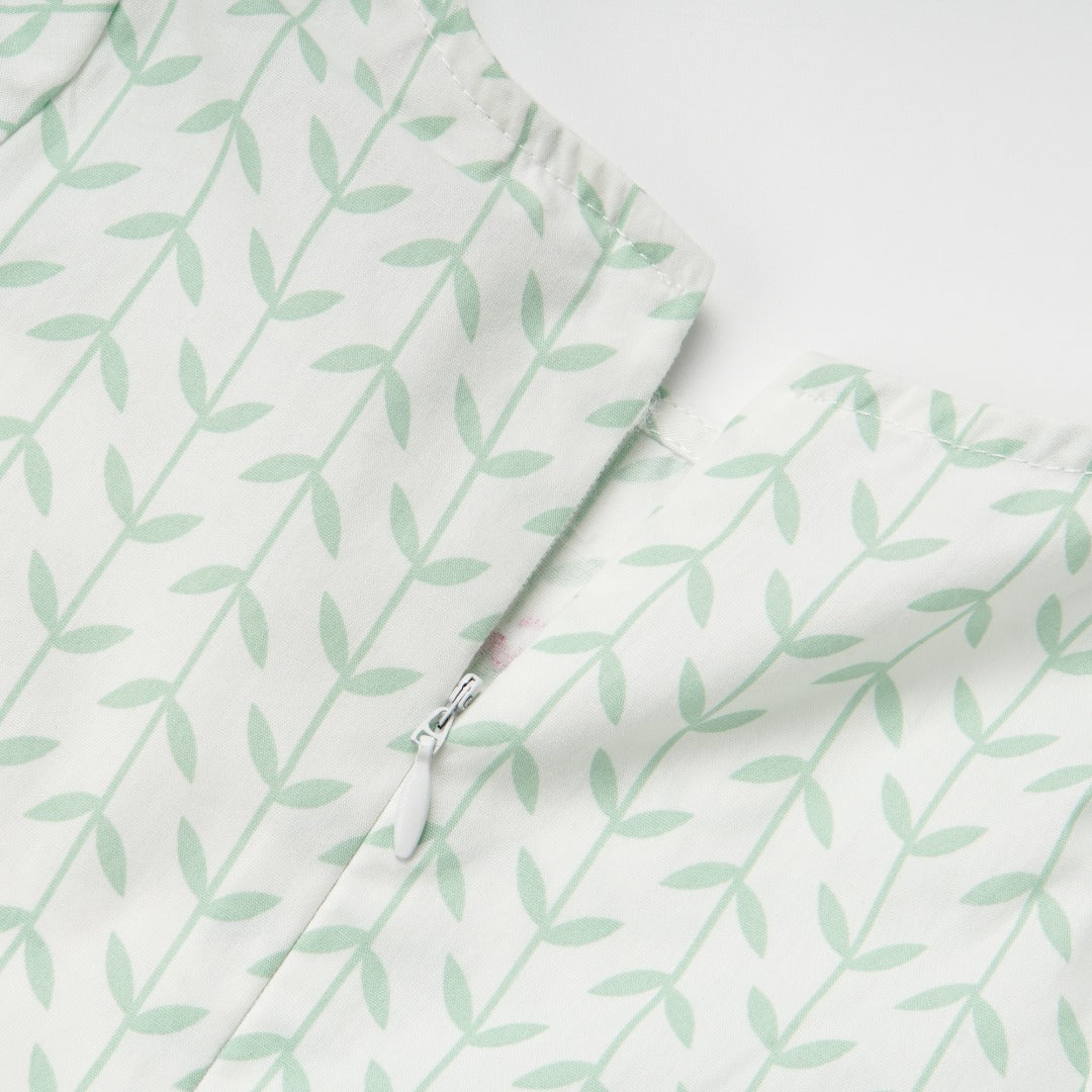 Light Green Dress, Long Sleeves and a zipper added at the back and embroidered logo.