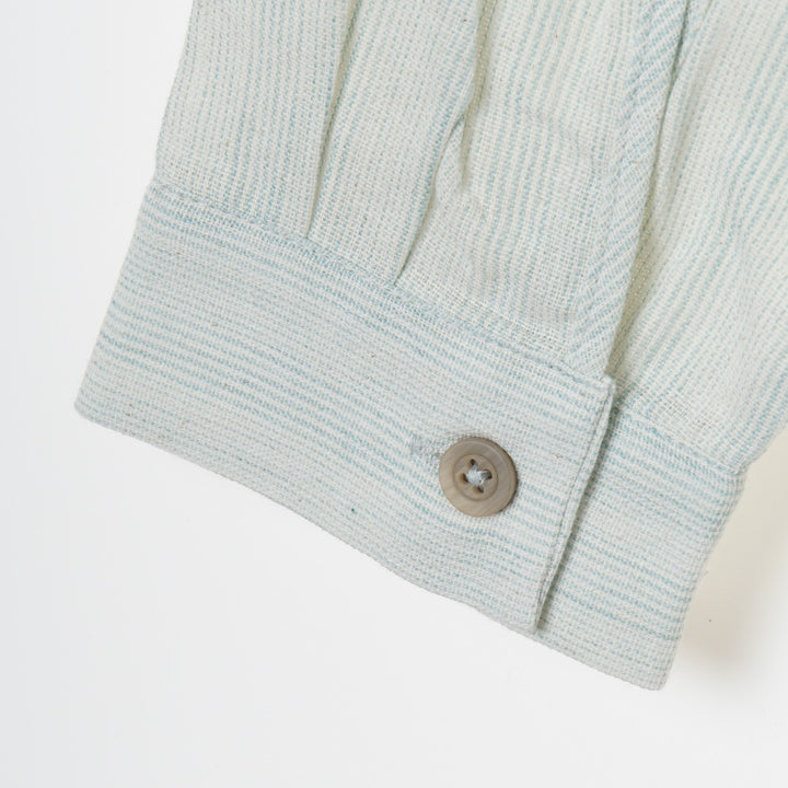 Comfortable beach tunic. Unique v-neck design and buttoned cuff sleeves for semi-formal/ casual look. Logo tag on the bottom right. 