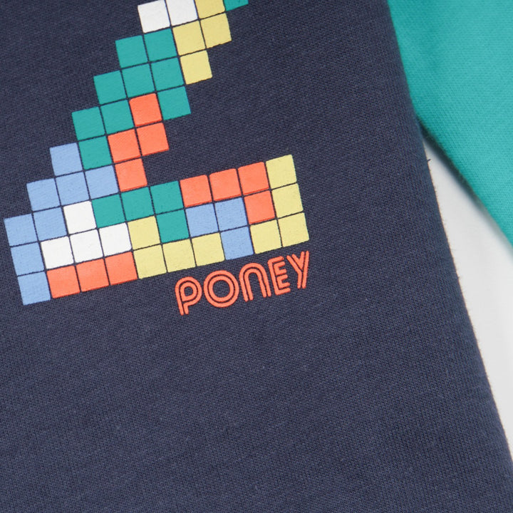 green and navy top, tetris design with shoulder fastening. 