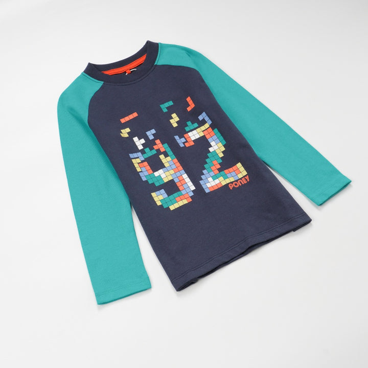 green and navy top, tetris design with shoulder fastening. 