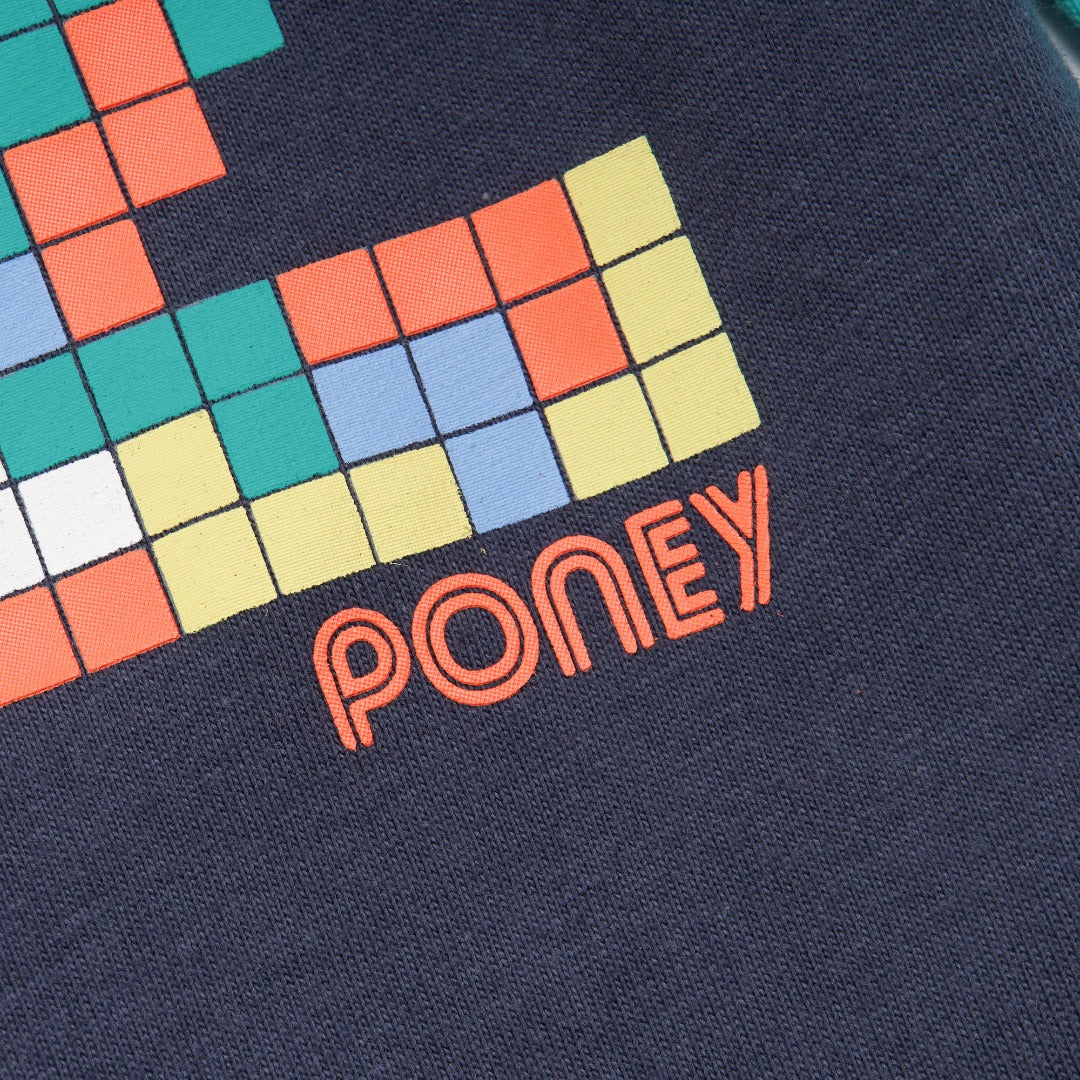 green and navy top, tetris design with shoulder fastening. 
