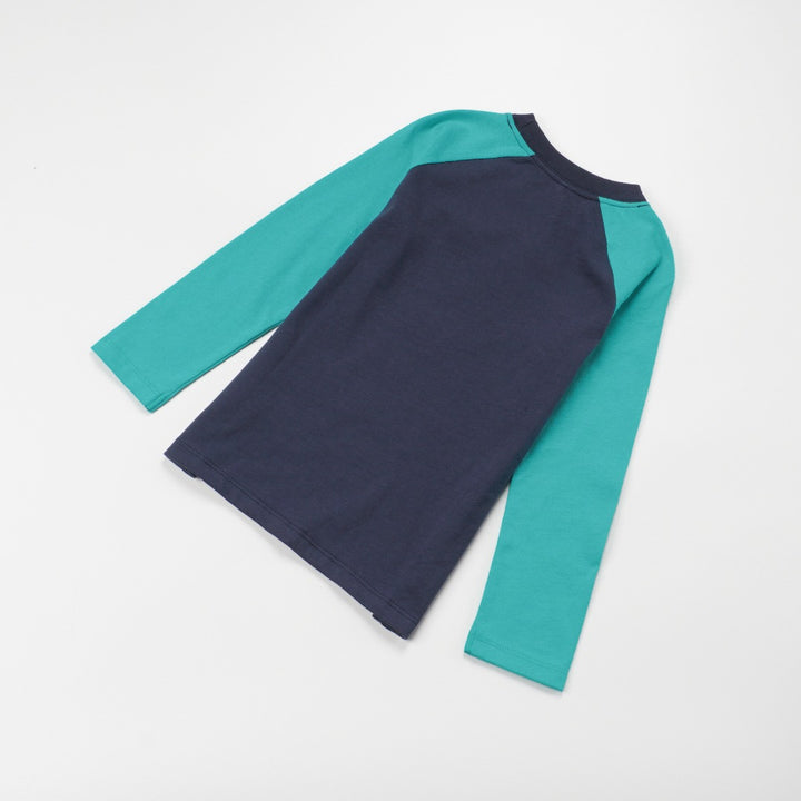 green and navy top, tetris design with shoulder fastening. 
