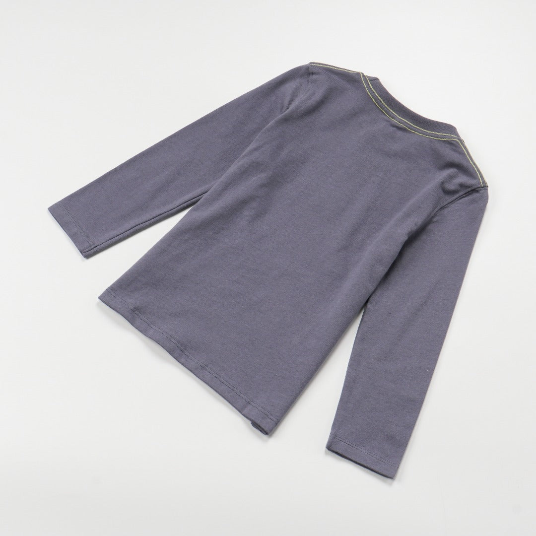 Dark grey top, blue fish skeleton and yellow poney bones. Doubled strapped shoulder fastenings, long sleeves. 