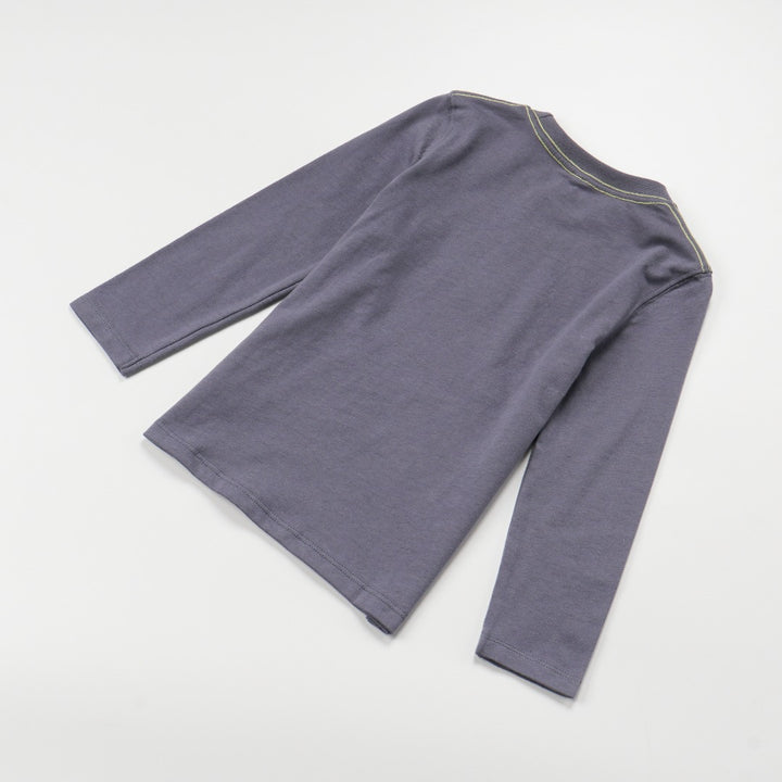 Dark grey top, blue fish skeleton and yellow poney bones. Doubled strapped shoulder fastenings, long sleeves. 